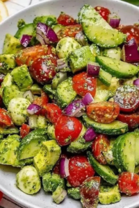 Explore 15 viral cucumber salad recipes packed with fresh flavors, from creamy avocado and yogurt combos to spicy Korean and smoked salmon bowls. Perfect for any meal cucumber salad, cucumber, cucumber recipes, cucumber tomato salad, cucumbers, salad, salmon salad recipes, salmon salad recipe, salad recipes, salad recipe, salads, viral, viral food recipes, salmon, recipes, salmon recipe, salmon dinner ideas, food, dinner ideas, dinner recipes for family, dinner ideas easy, vegetarian recipes